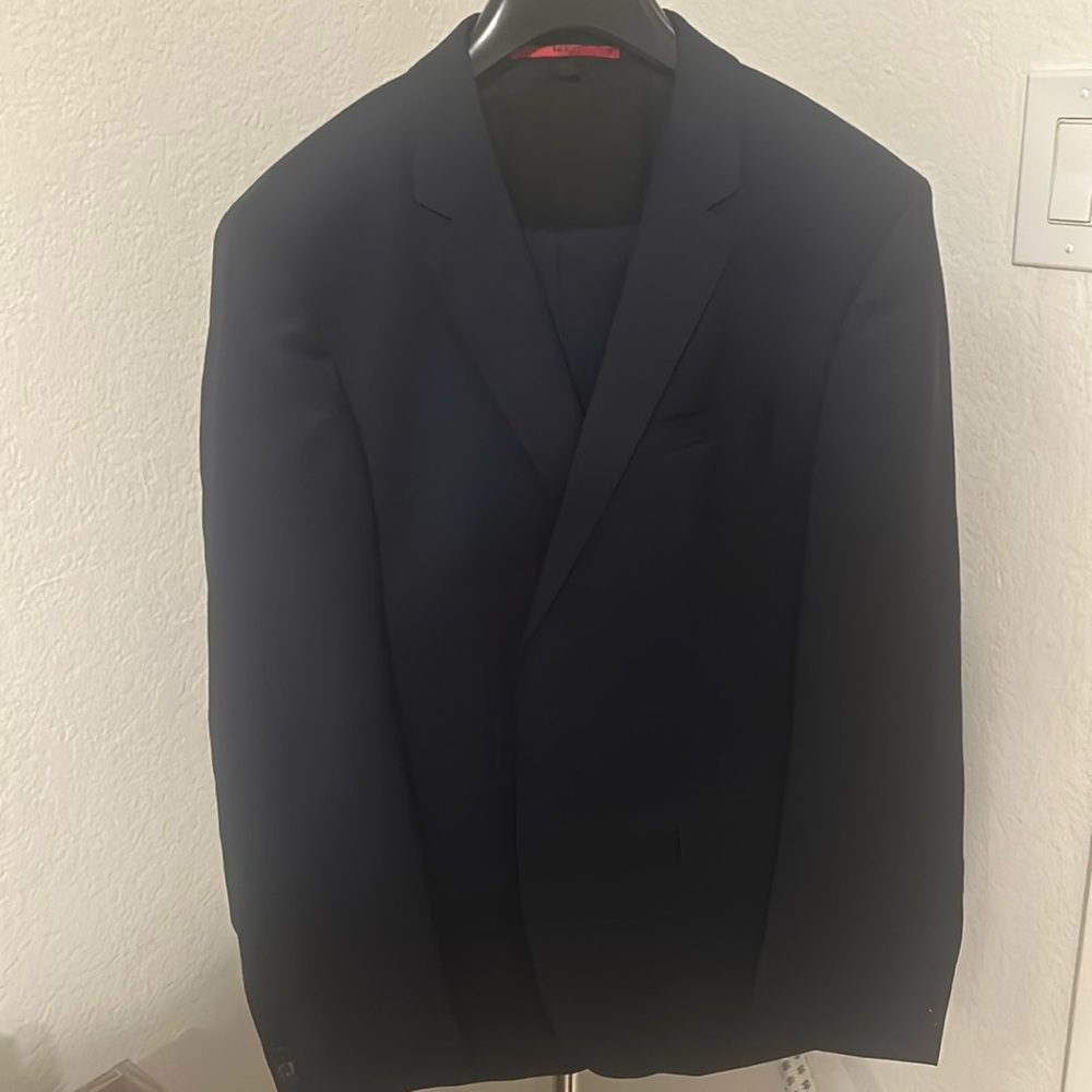 Hugo Boss navy suit made by HUGO -red label.. Worn once only